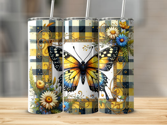 Yellow and blue butterfly on a plaid tumbler with floral accents.