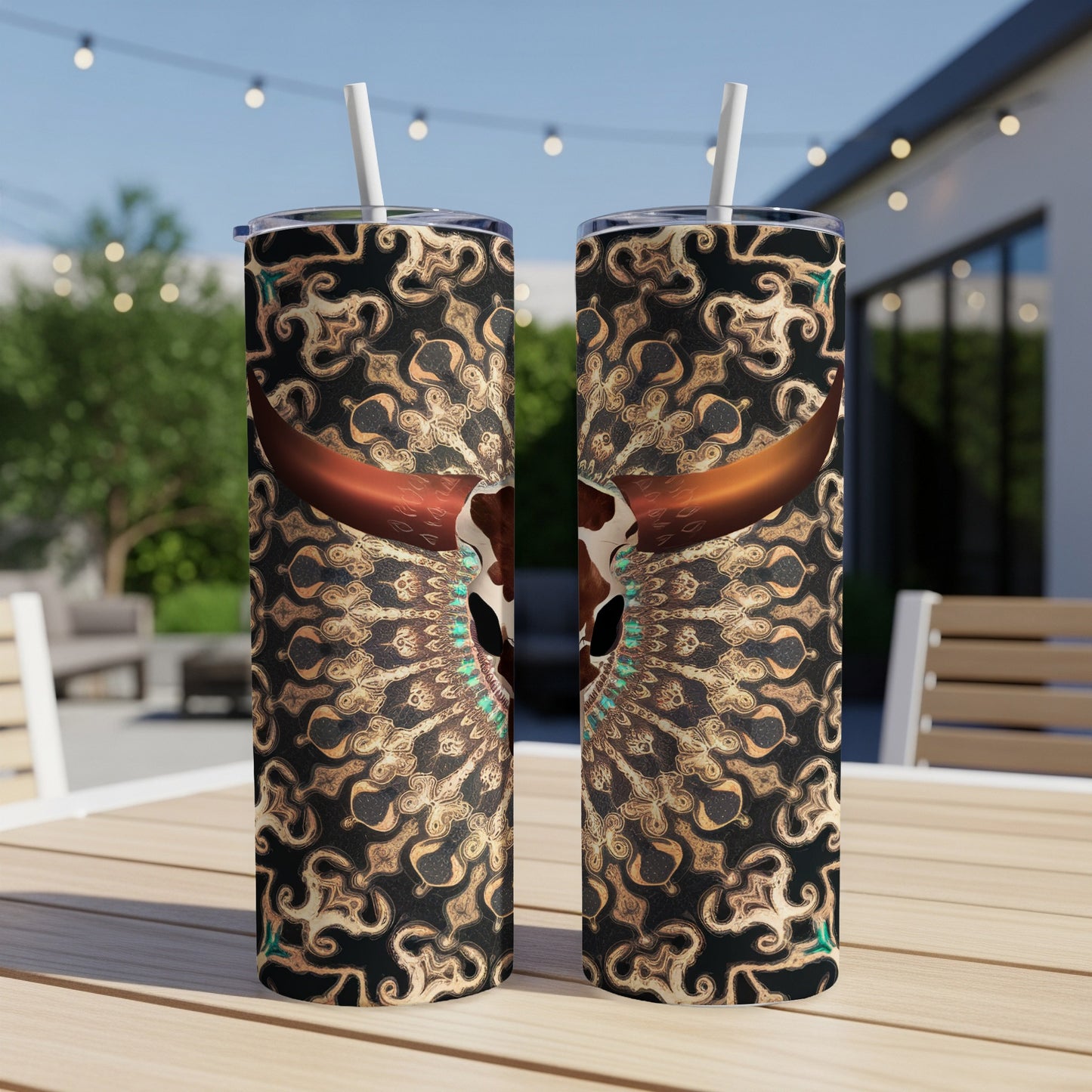 Two tumblers with a bull skull and ornate pattern design.
