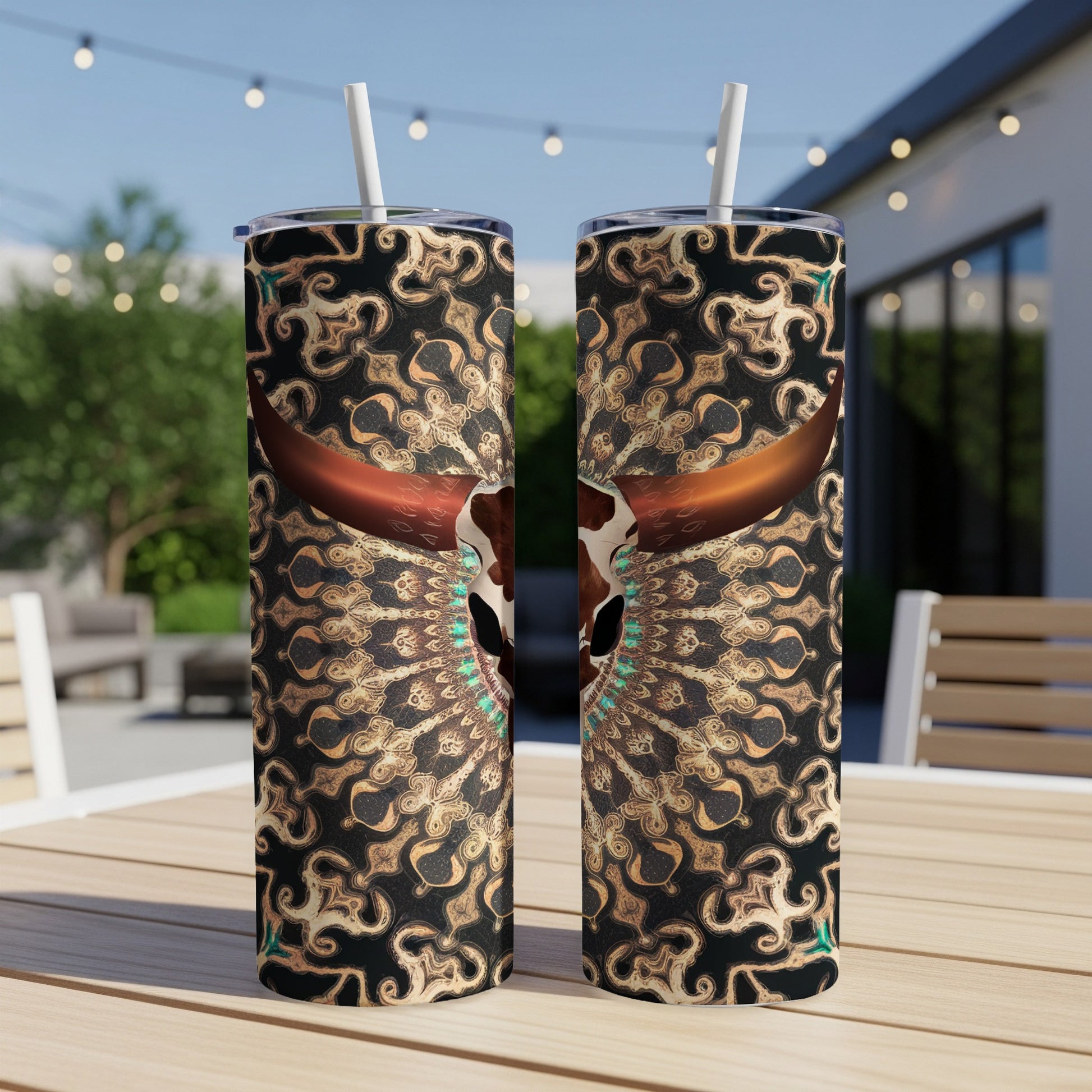 Two tumblers with a bull skull and ornate pattern design.