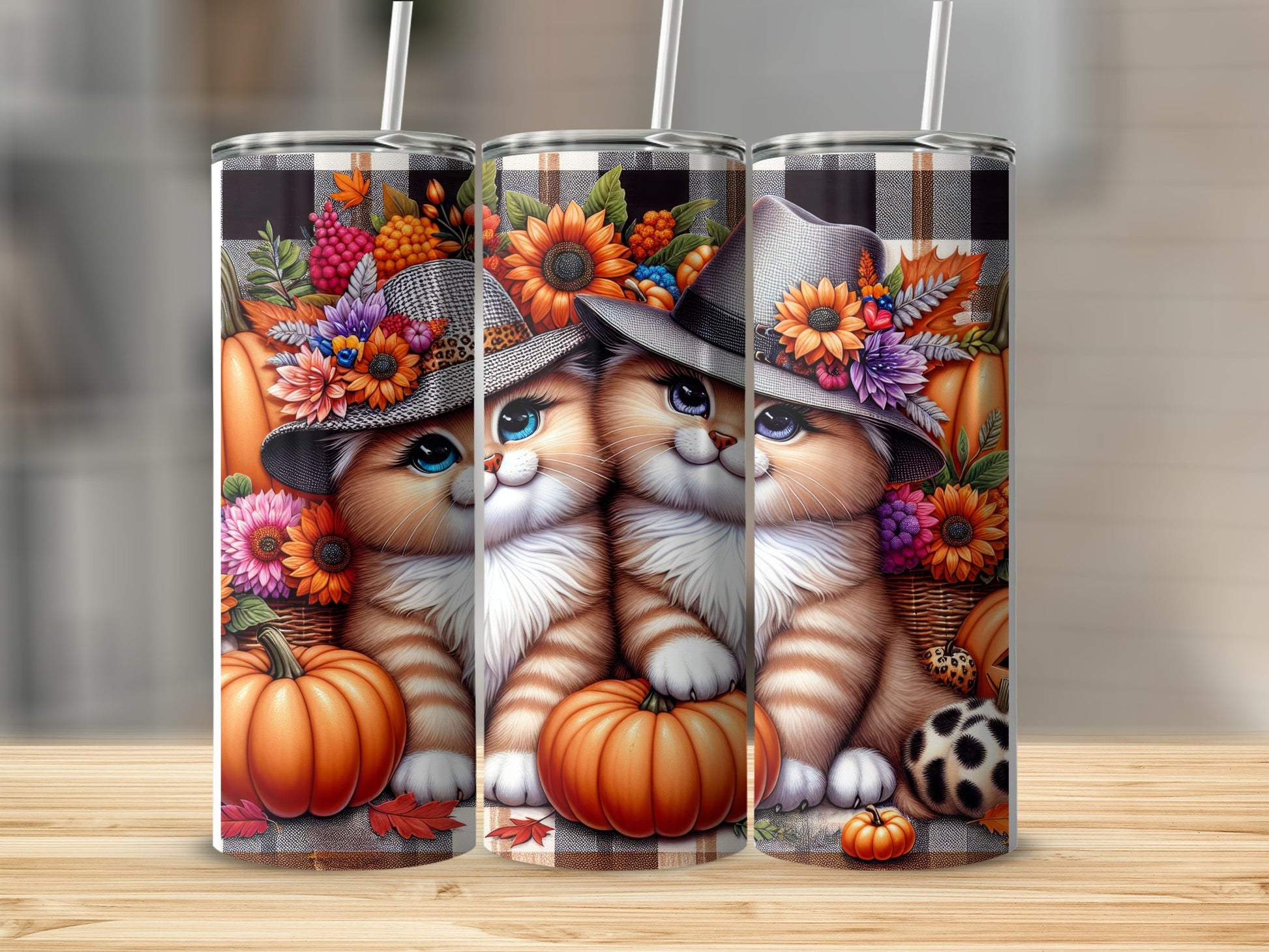 Two cartoon cats in hats and scarves with pumpkins and flowers, on tumblers.
