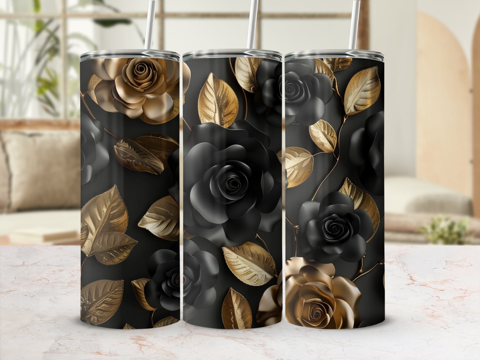 Three tumblers with black and gold rose and leaf patterns.