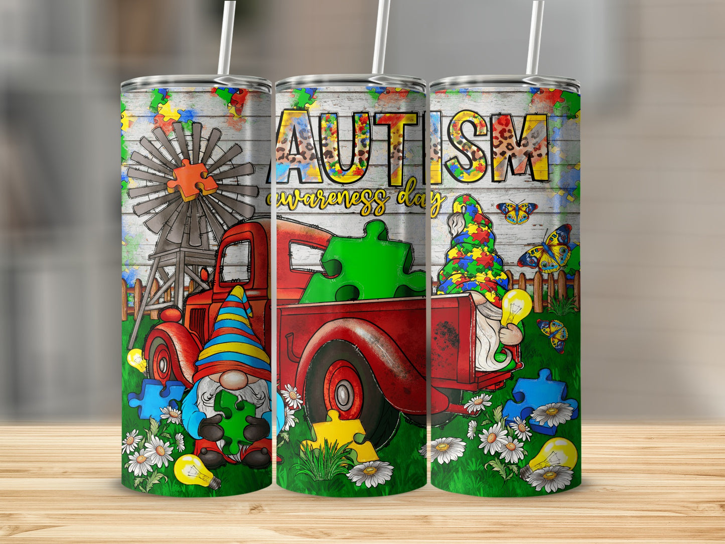 Tumbler with red truck, gnome, and "Autism awareness day" text.