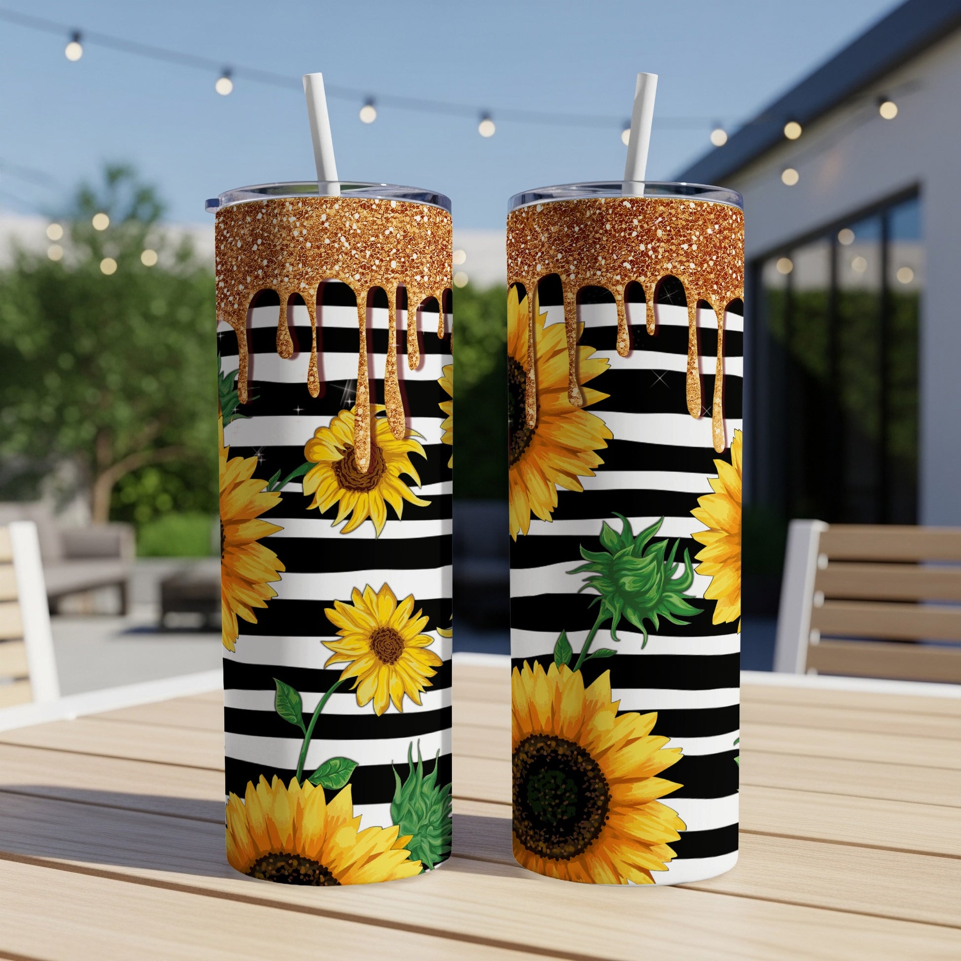 Two tumblers with sunflowers and black and white stripes.