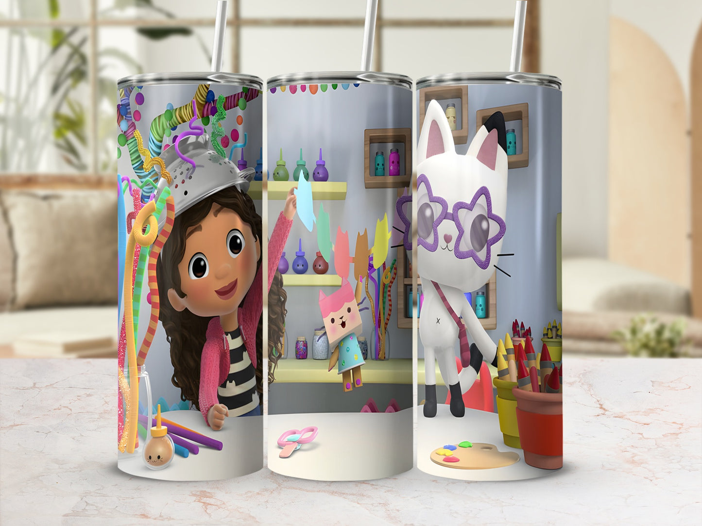 Gabby's Dollhouse characters and art supplies wrap around a tumbler.