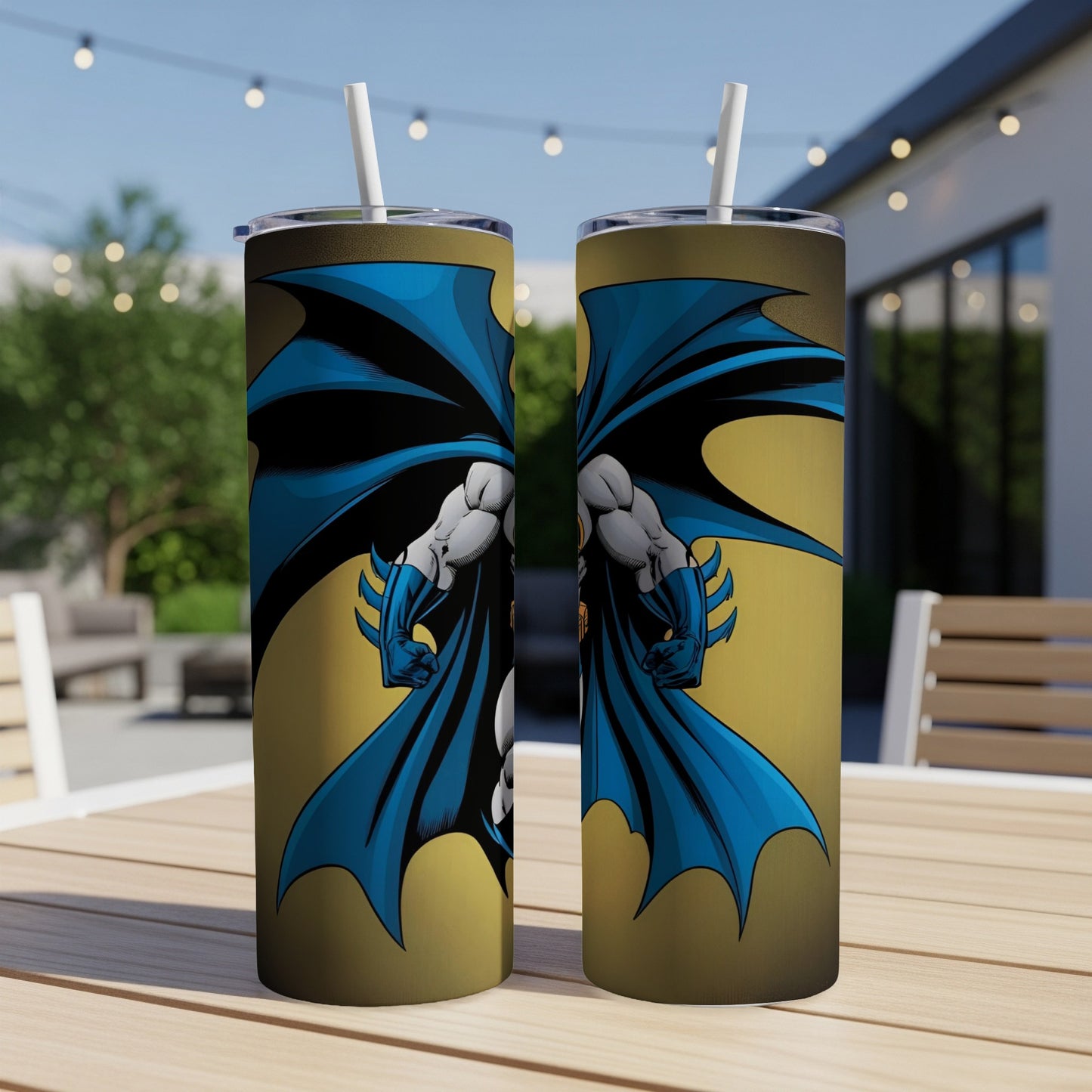 Batman character illustration on two cylindrical tumblers with straws.