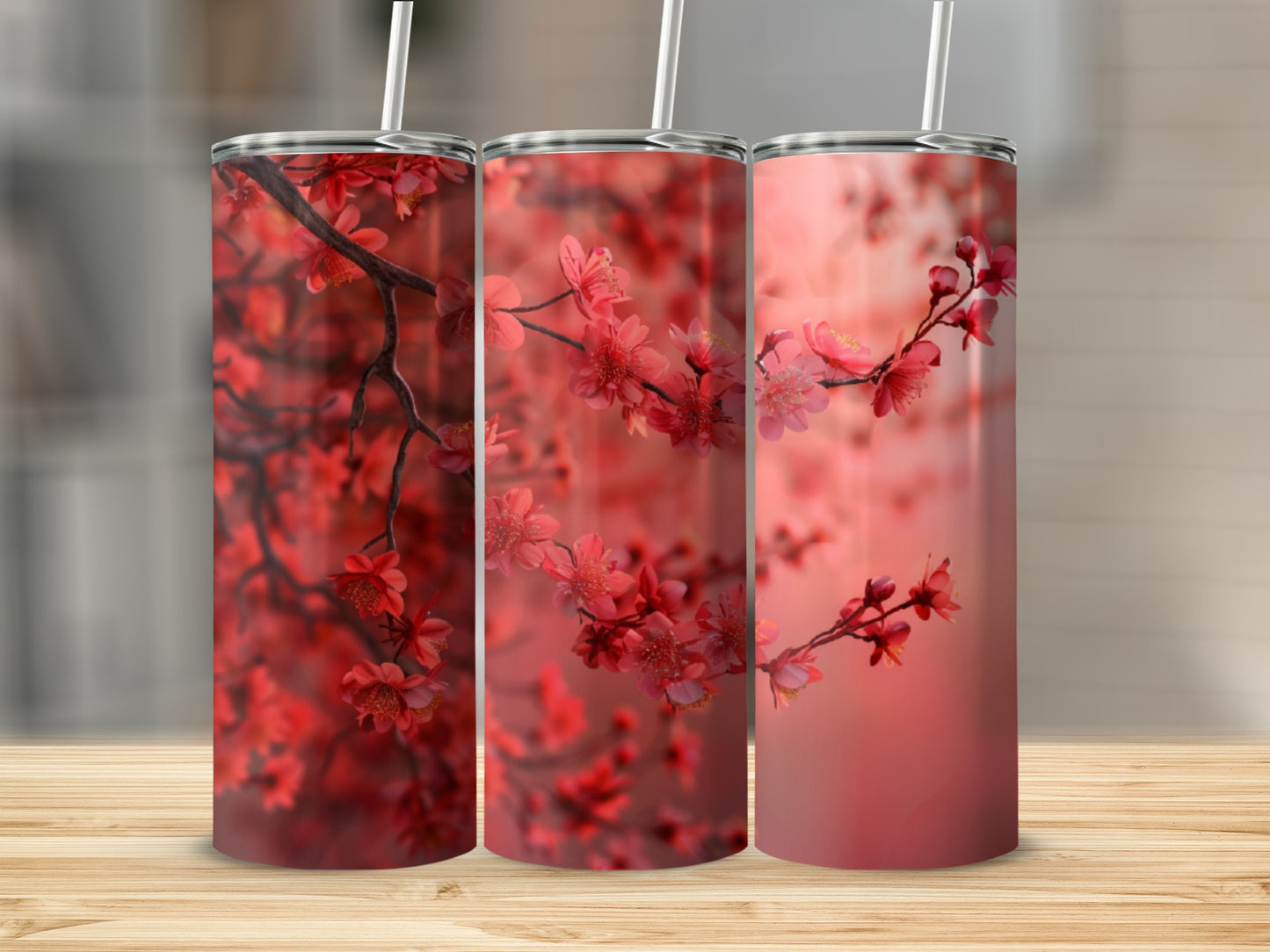 Three tumblers with red floral cherry blossom design.
