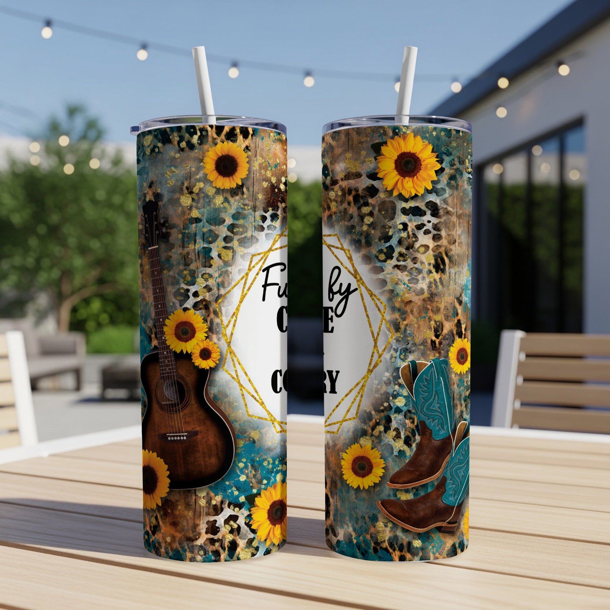 Floral and leopard print tumbler with sunflowers, guitar, and cowboy boots.