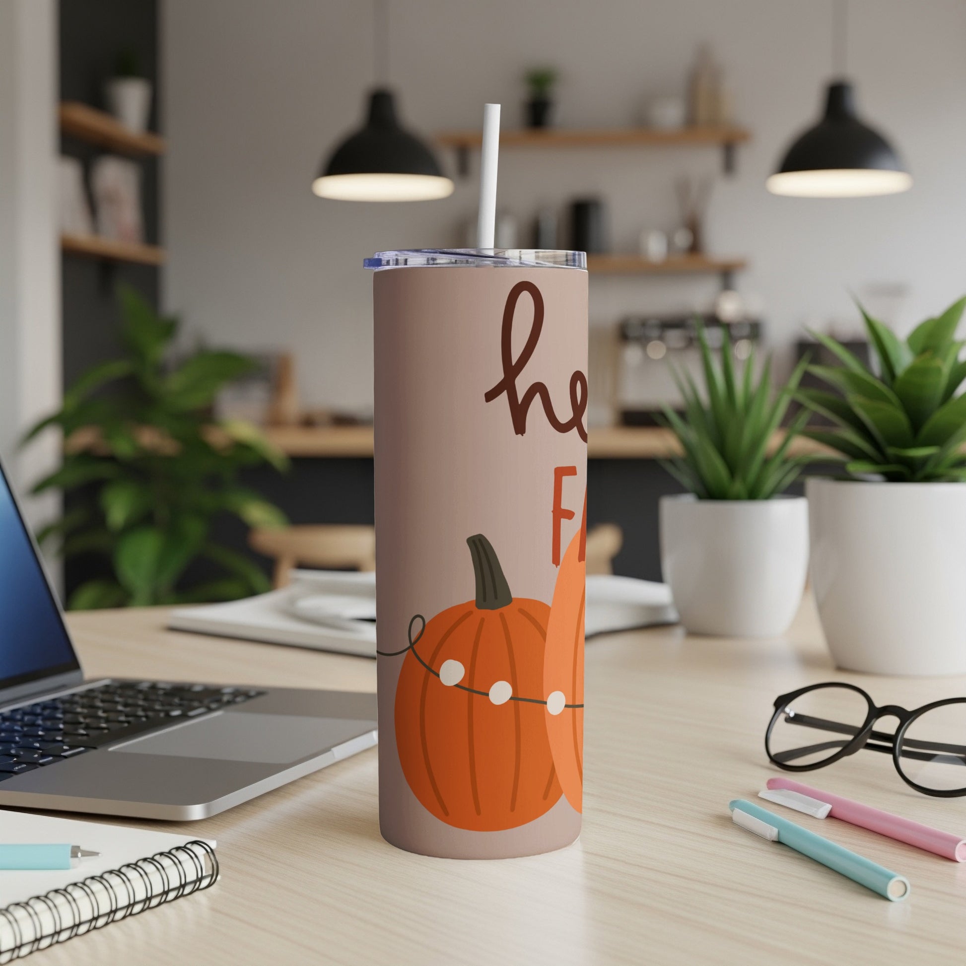 Tumbler with "hello fall" and pumpkins, with a straw.