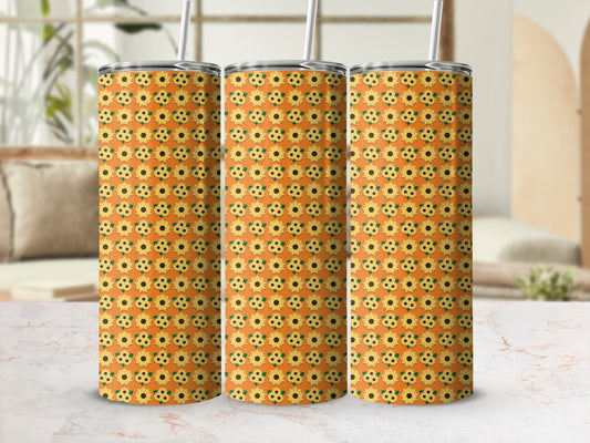 Three tumblers with a repeating sunflower pattern on an orange background.