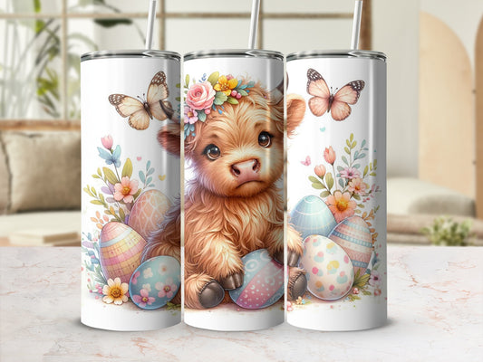 Fluffy Highland calf with Easter eggs and butterflies, floral wreath.