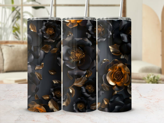 Three dark floral tumblers with gold accents and straws.