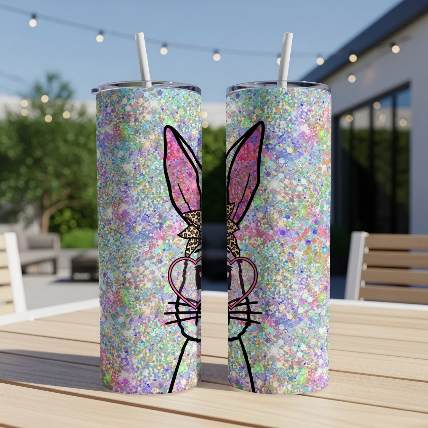 Two glittery bunny tumblers with pink ears and heart-shaped glasses.