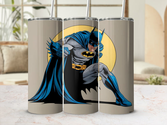 Batman in a crouched pose on a beige tumbler.