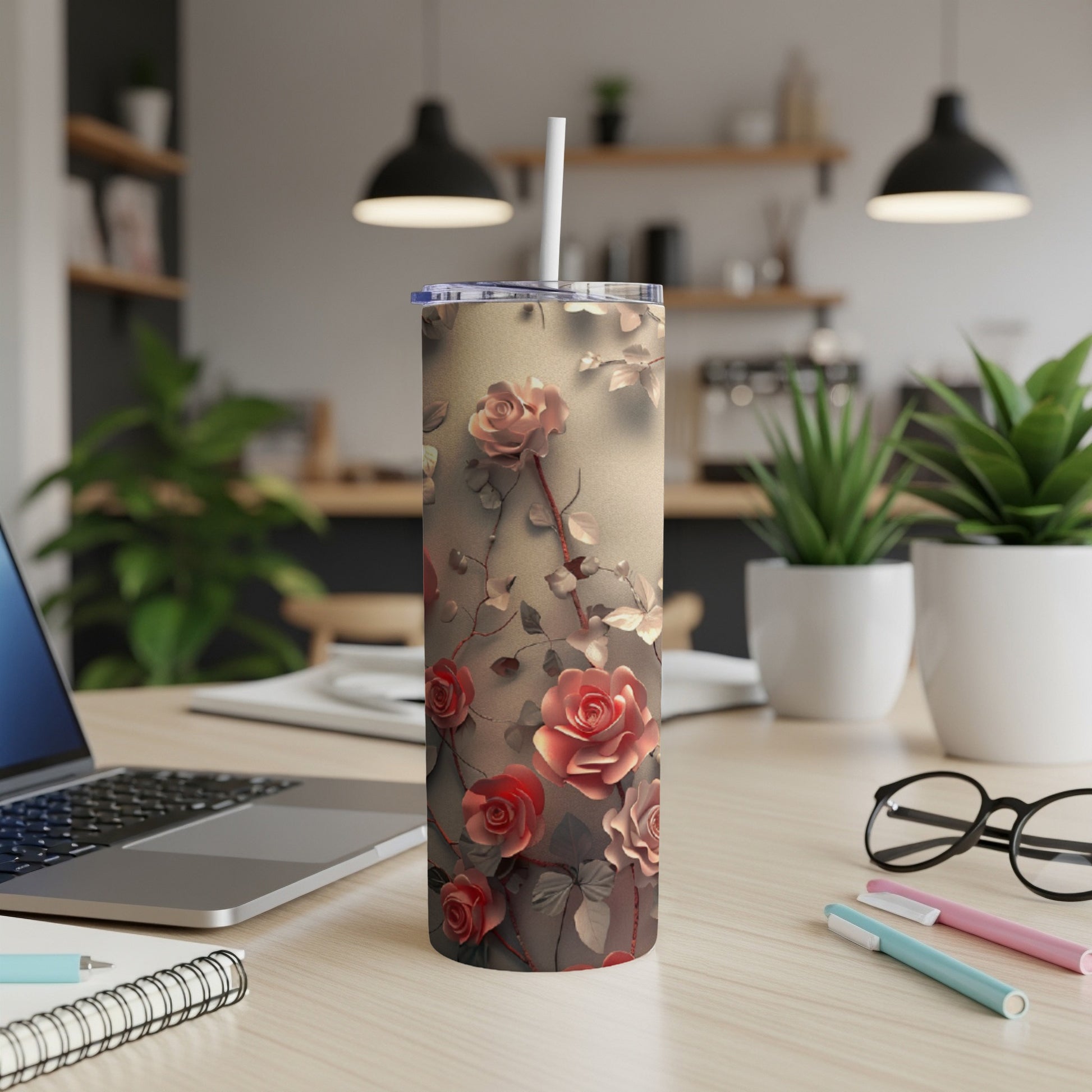 Tumbler with a detailed floral rose pattern on a light beige background.