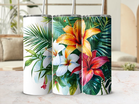 Three tumblers with vibrant tropical floral designs and green leaves.