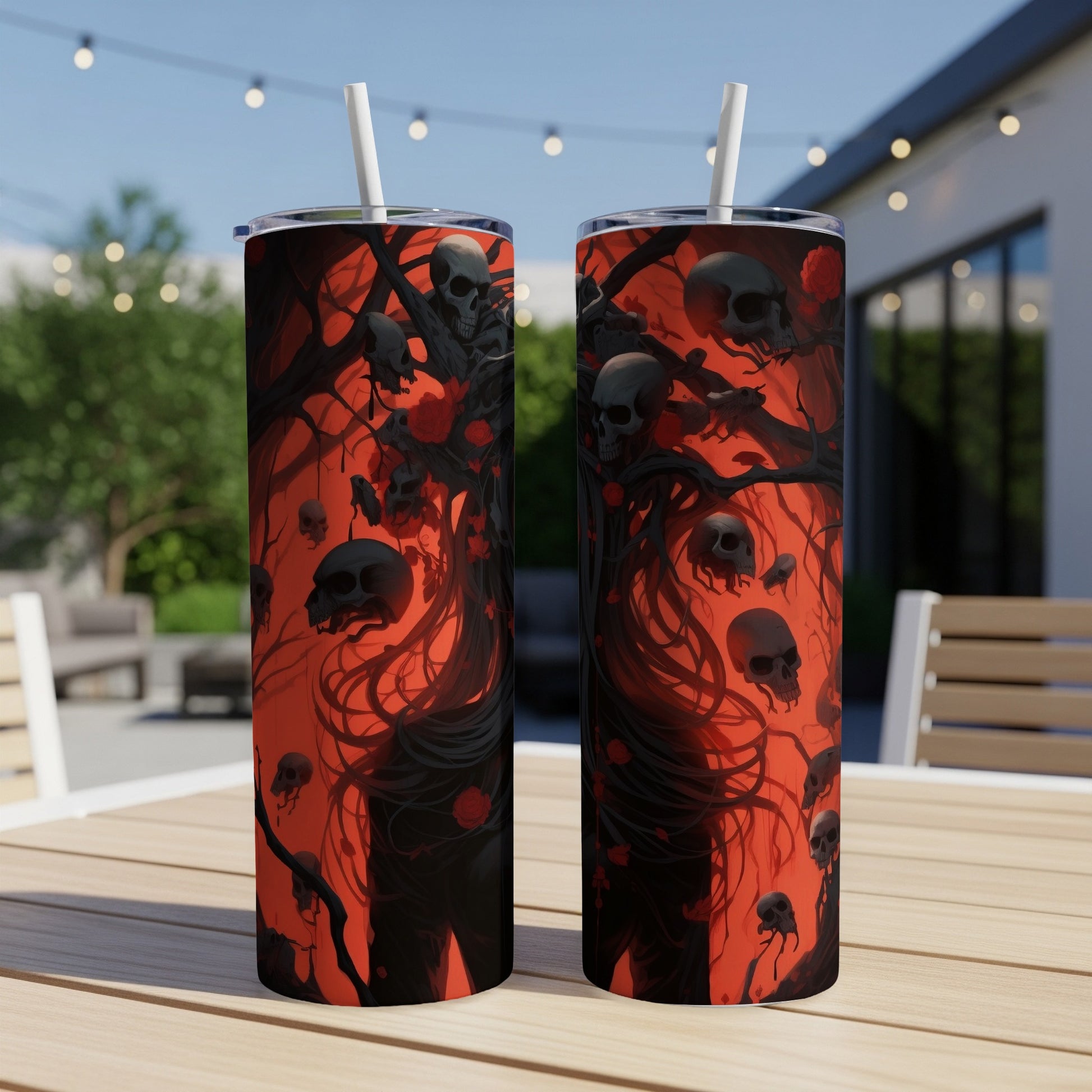 Tumblers with a spooky design of skulls and thorny vines against a red background.