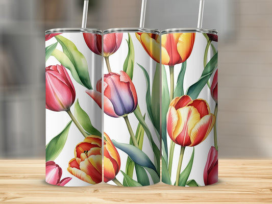 Three tumblers with a floral design of red, pink, and yellow tulips.