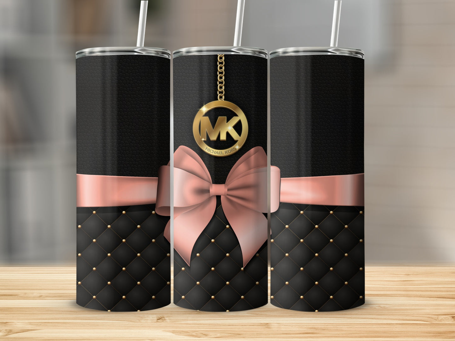 Black Quilted Tumbler with Pink Bow and Gold Logo Design