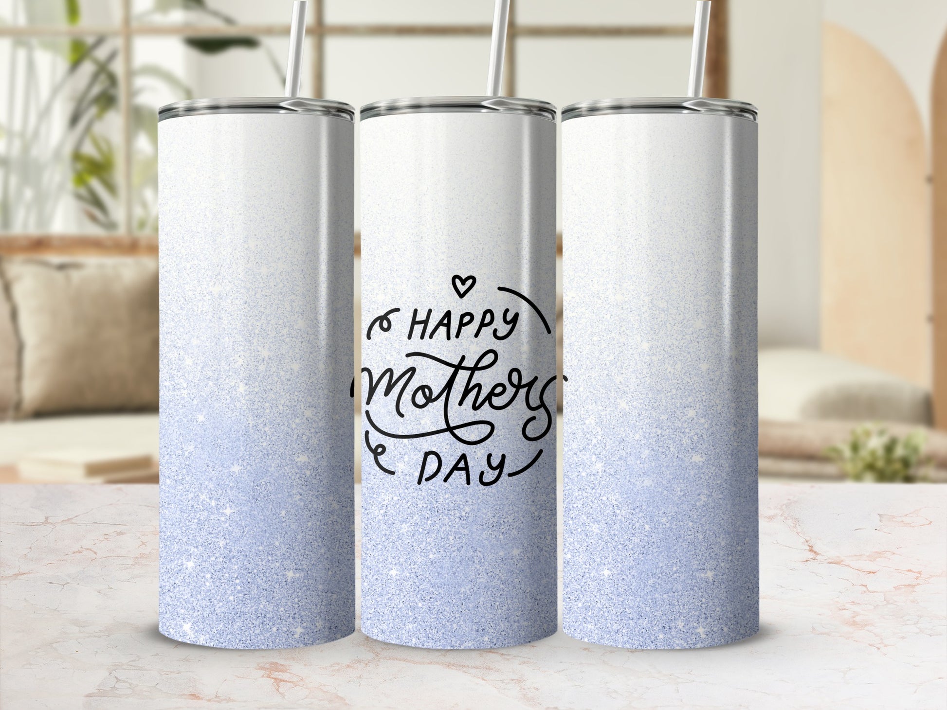 White gradient tumbler with "Happy Mother's Day" text and blue glitter.