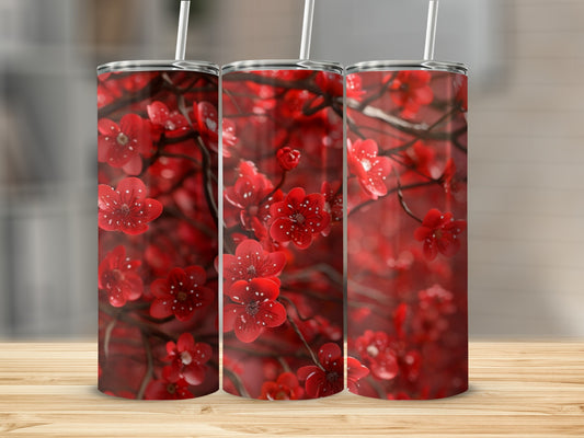 Three tumblers with a red floral design.