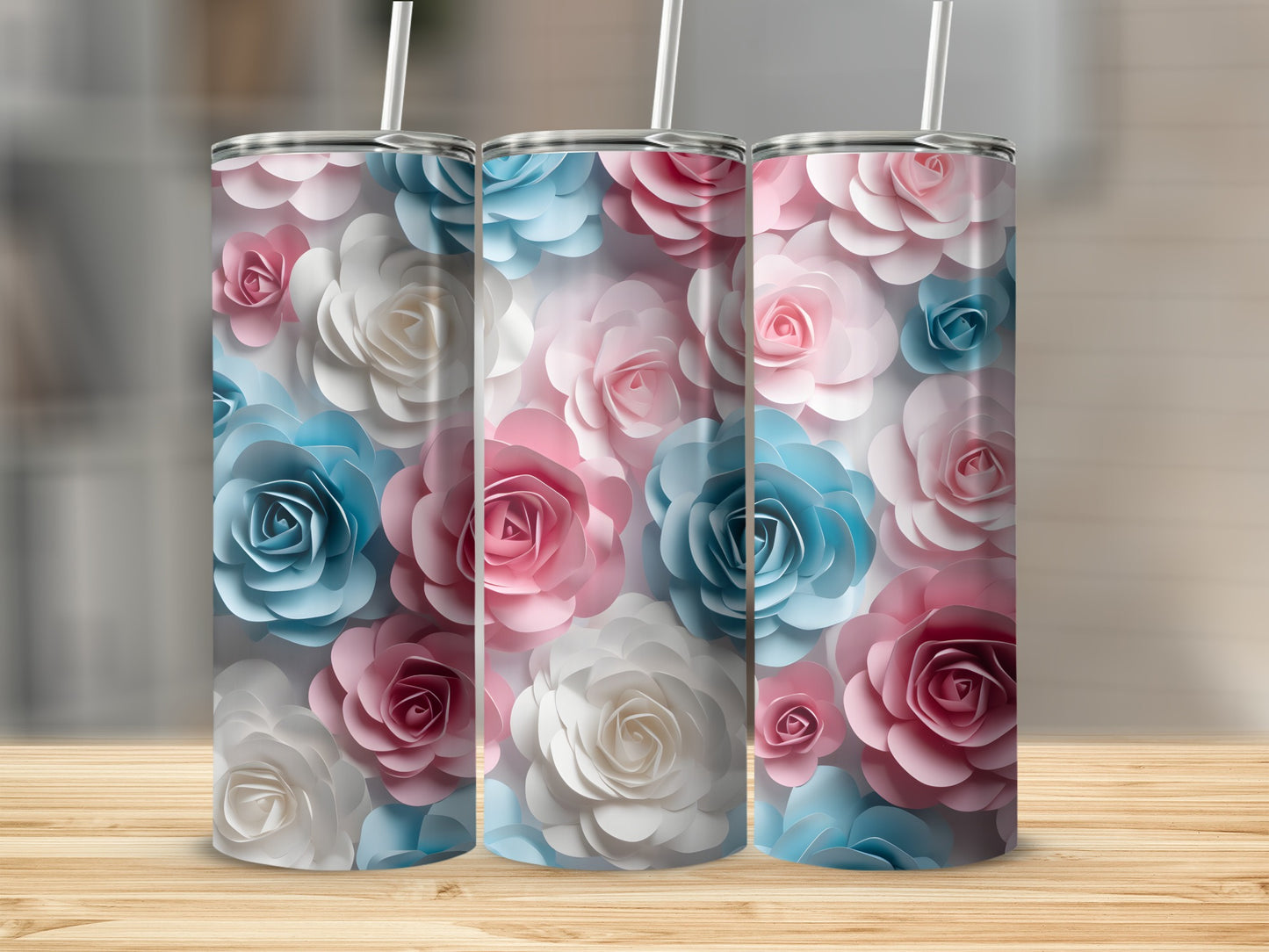Three tumblers with pink, white, and blue paper roses design.