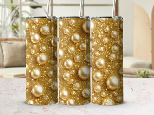 Gold glitter and pearl pattern on three identical tumblers.