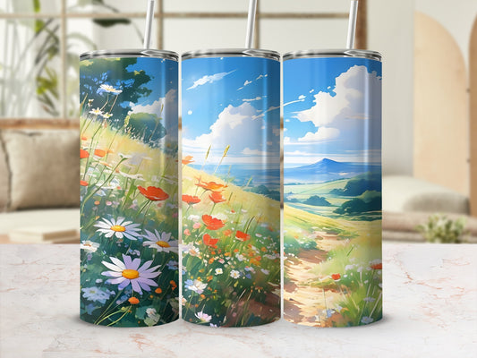 Three tumblers with a vibrant wildflower meadow and rolling hills landscape.