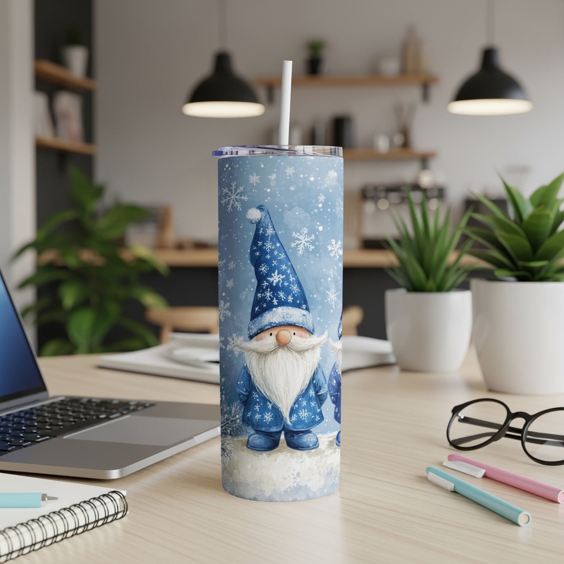 Blue tumbler with snow, snowflakes, and two gnomes.