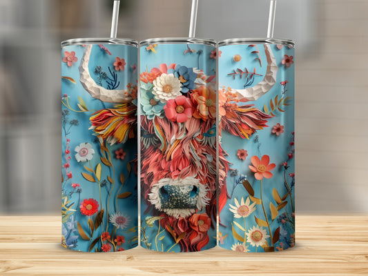 Blue tumbler with Highland cow and floral design.