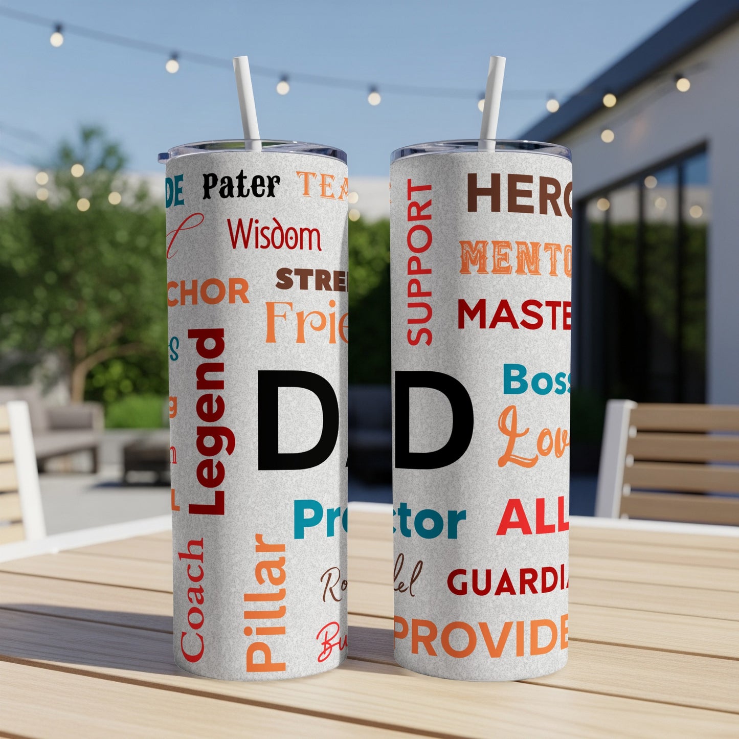 Two tumblers with "Dad" and words like Mentor, Hero, and Protector.