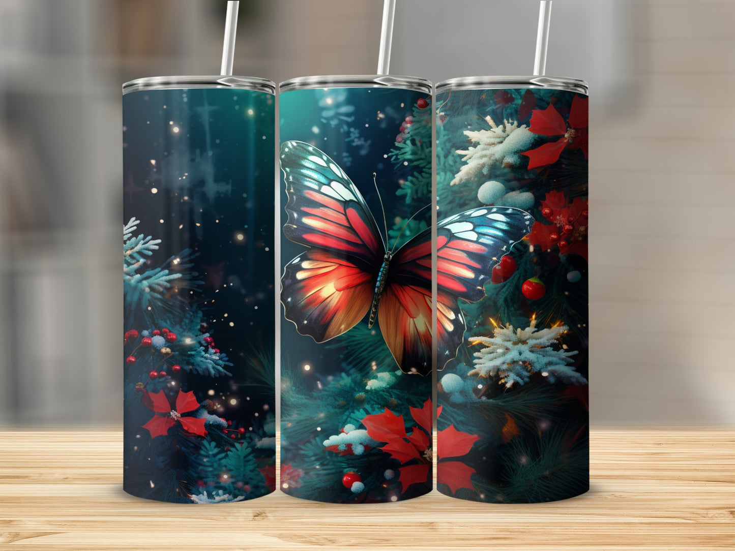 Three tumblers featuring a butterfly on a Christmas tree with bokeh lights.