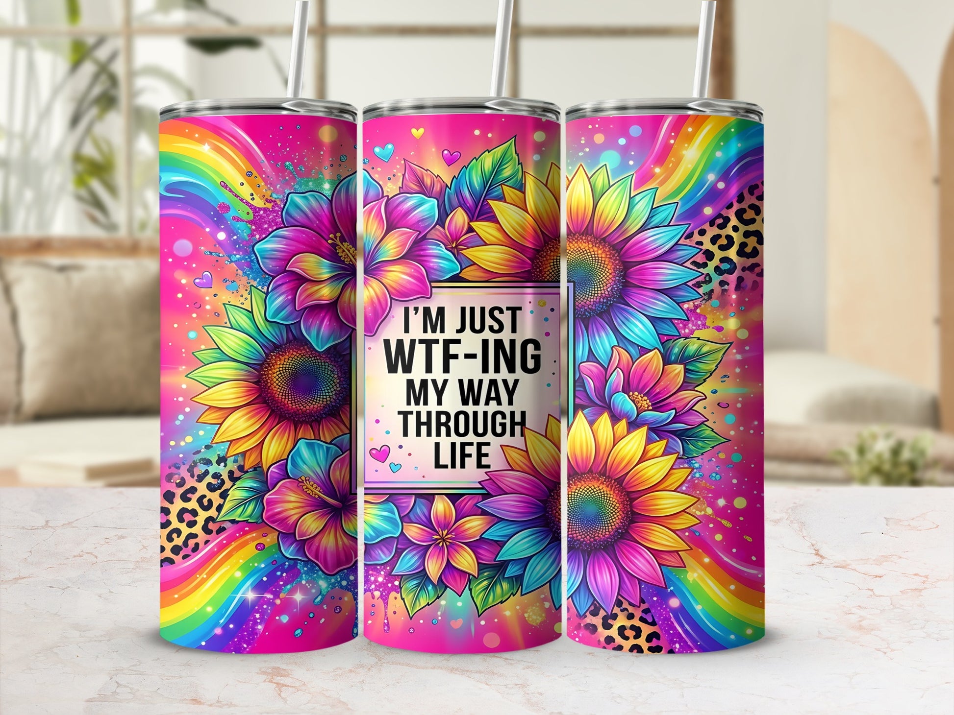 Tumbler with rainbow, floral, and leopard print, reads "I'm just WTF-ing my way through life."