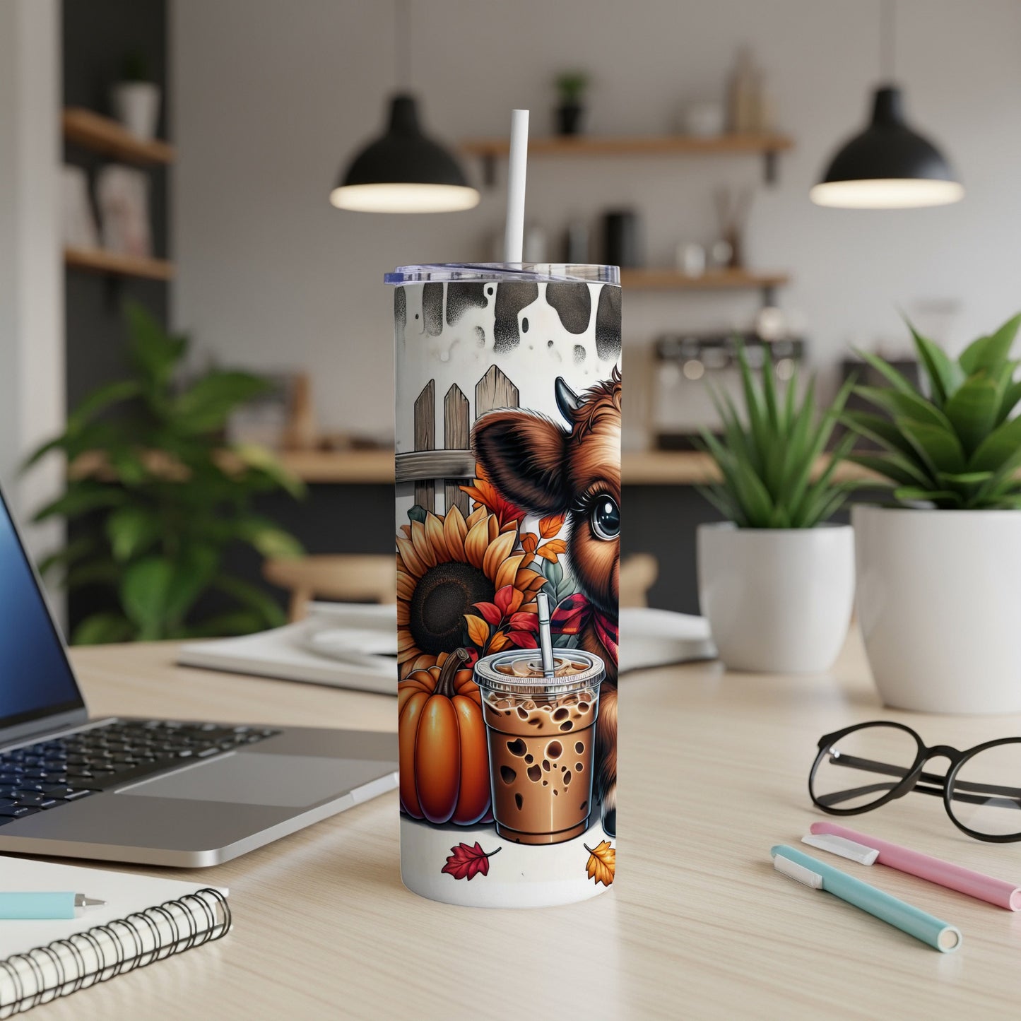 Cow, pumpkins, and sunflowers tumbler with a white straw.