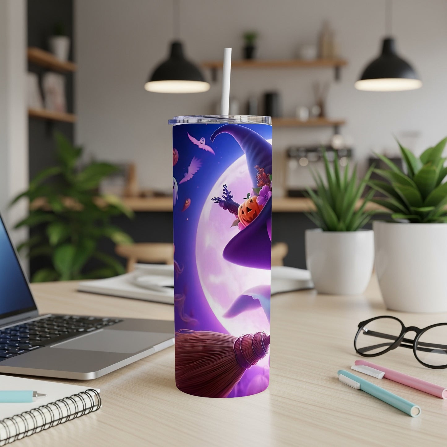Halloween tumbler with witch hat, broom, pumpkin, and ghosts against a full moon.