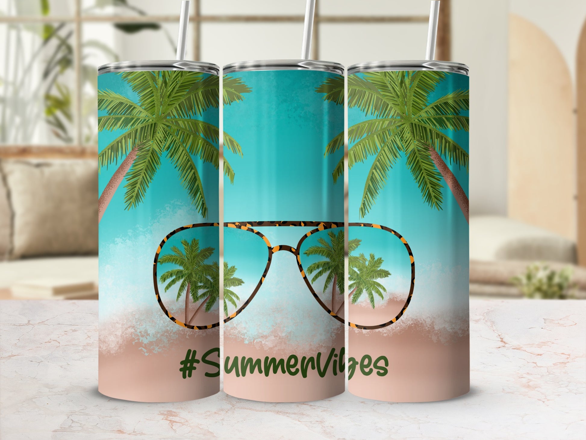 Three tumblers with palm trees and #SummerVibes reflected in sunglasses.