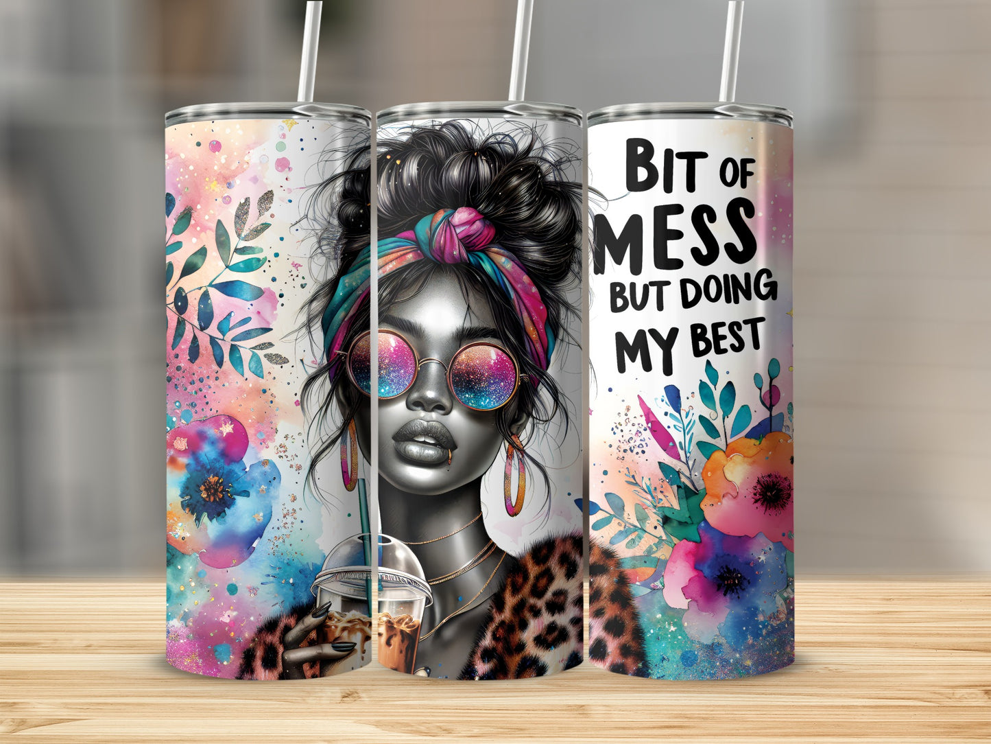 Trio of tumblers featuring a woman with colorful paint splatters and leopard print.
