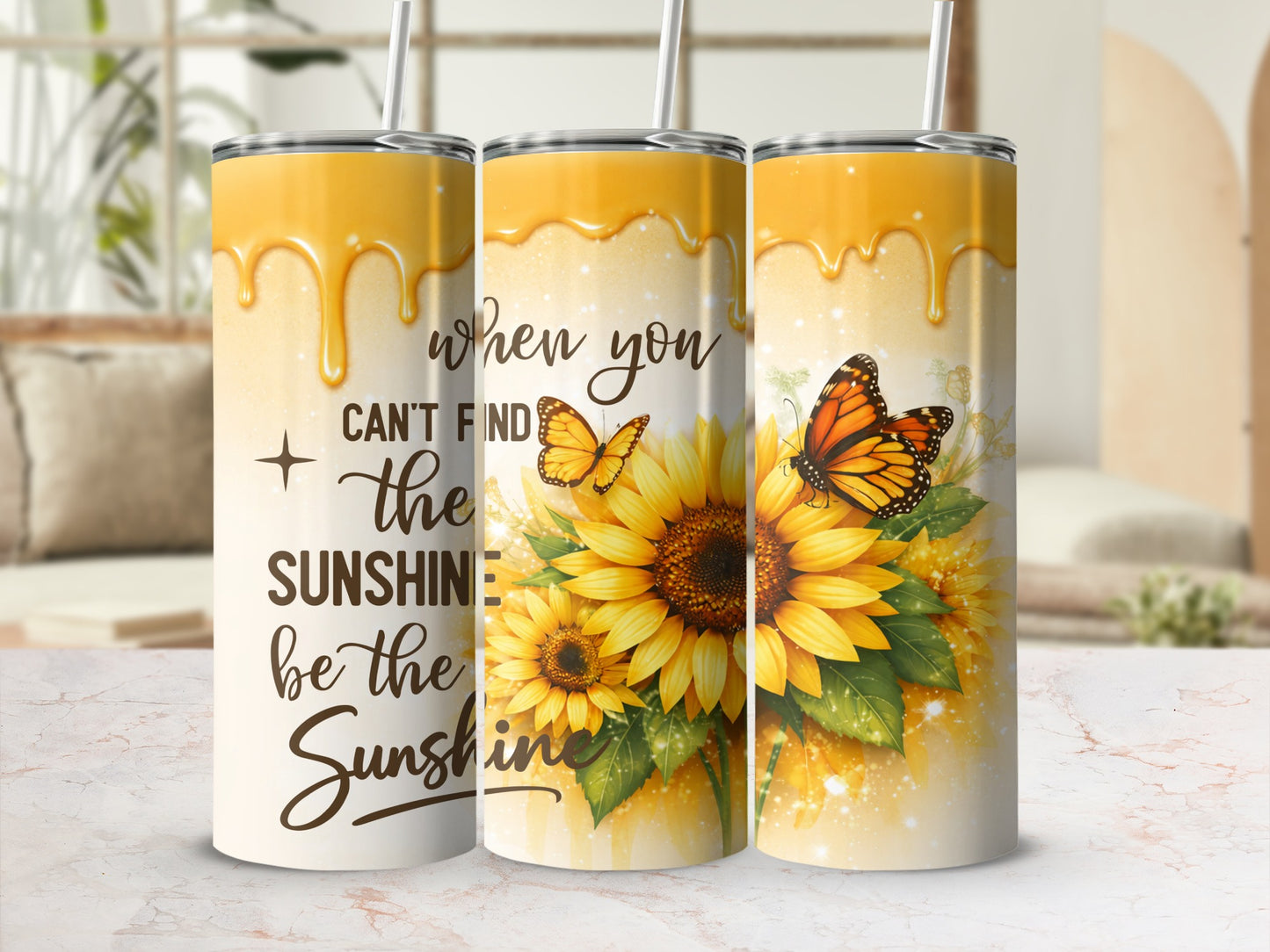 Sunflower and butterfly tumbler with dripping yellow design and inspirational text.