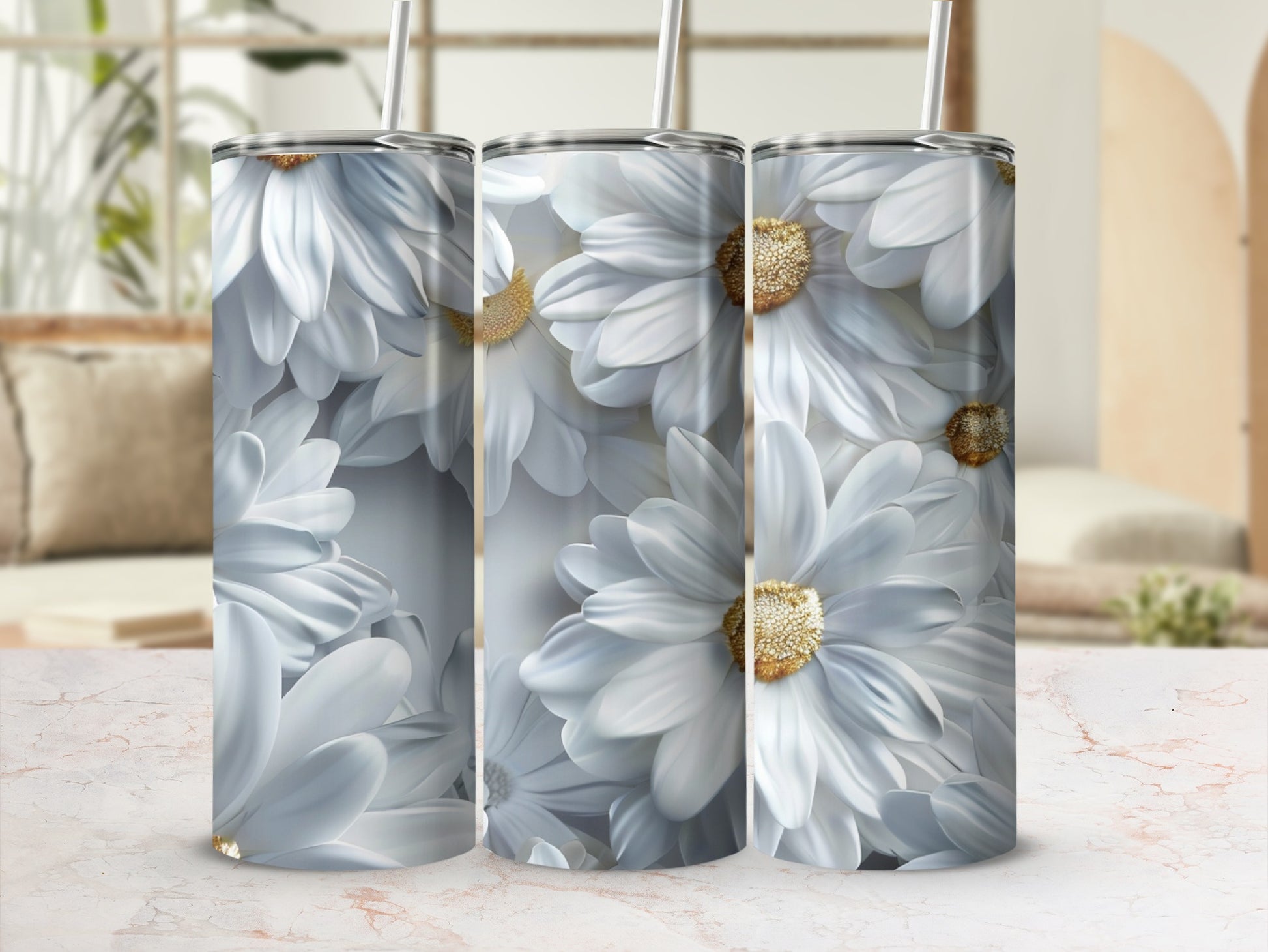 Three tumblers with white daisy floral pattern.