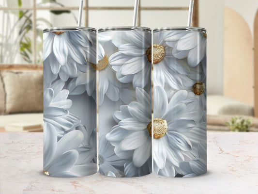 Three tumblers with white daisy floral pattern.