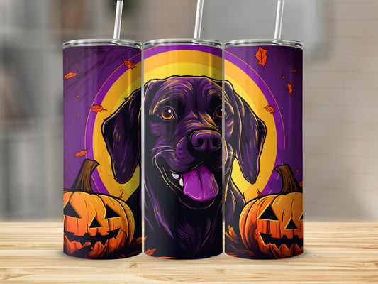 Black dog with pumpkins and autumn leaves on a Halloween themed tumbler.