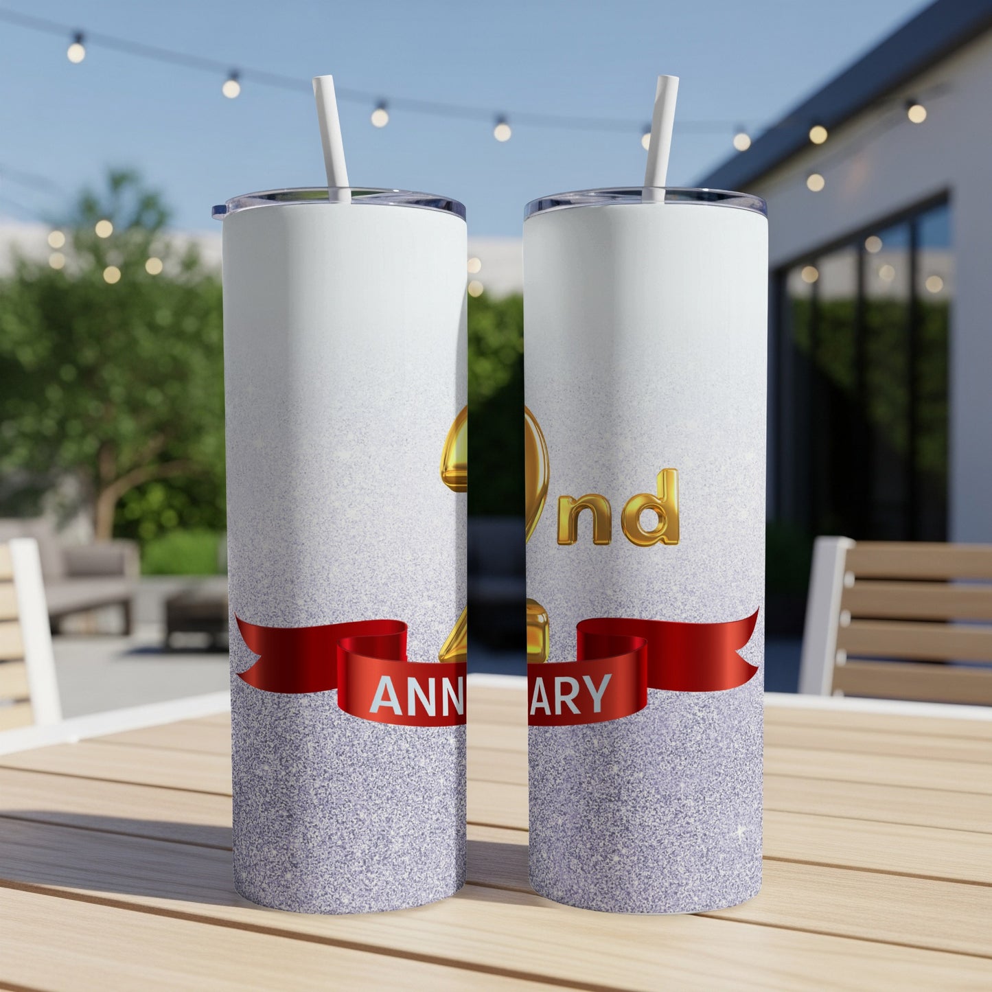 Two tumblers with "49th Anniversary" in gold text and a red ribbon.