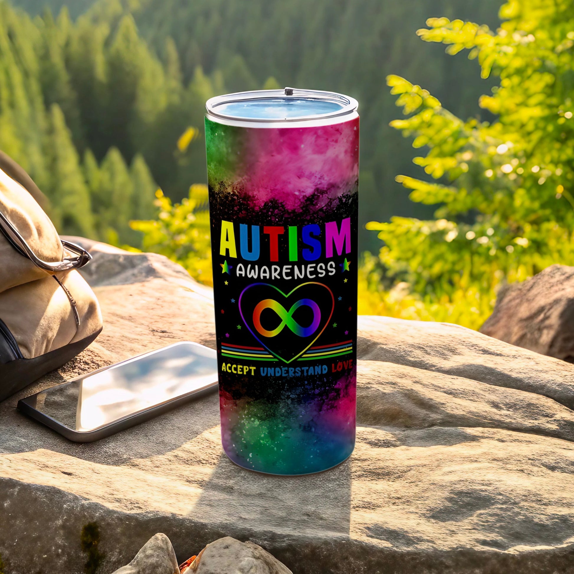 Autism Awareness heart rainbow tumbler with "Accept Understand Love" text.