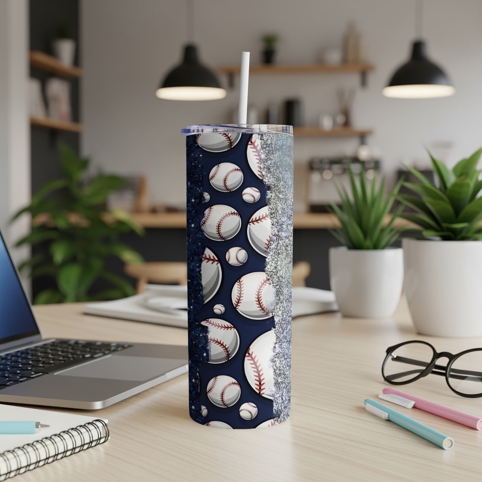 Tumbler with baseballs and glitter pattern, with white straw.
