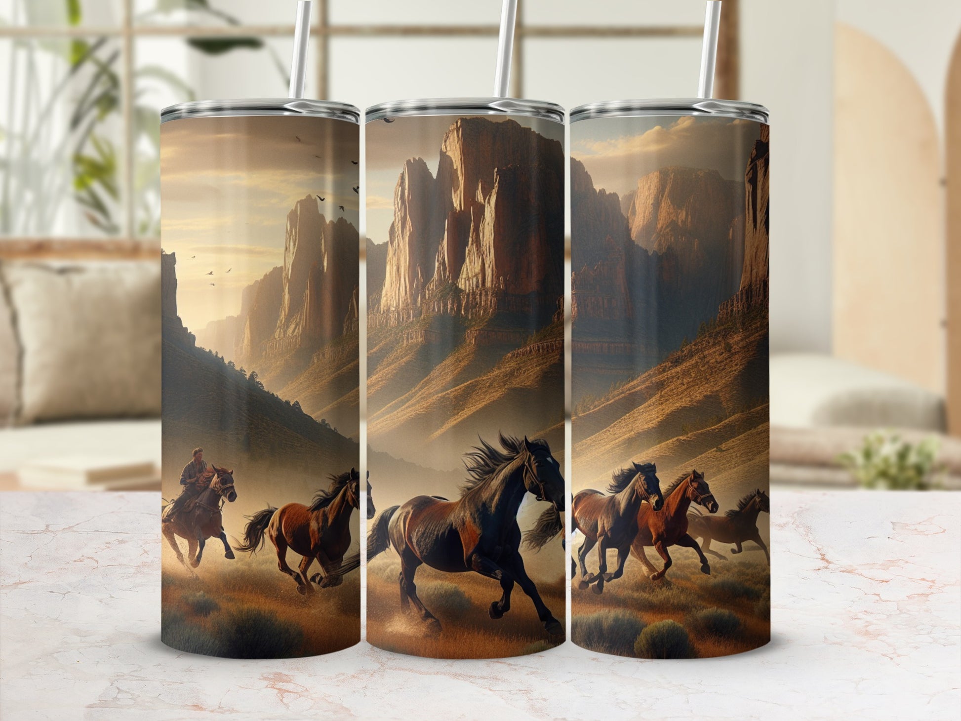 Three tumblers feature a sunset scene with horses running in a canyon.