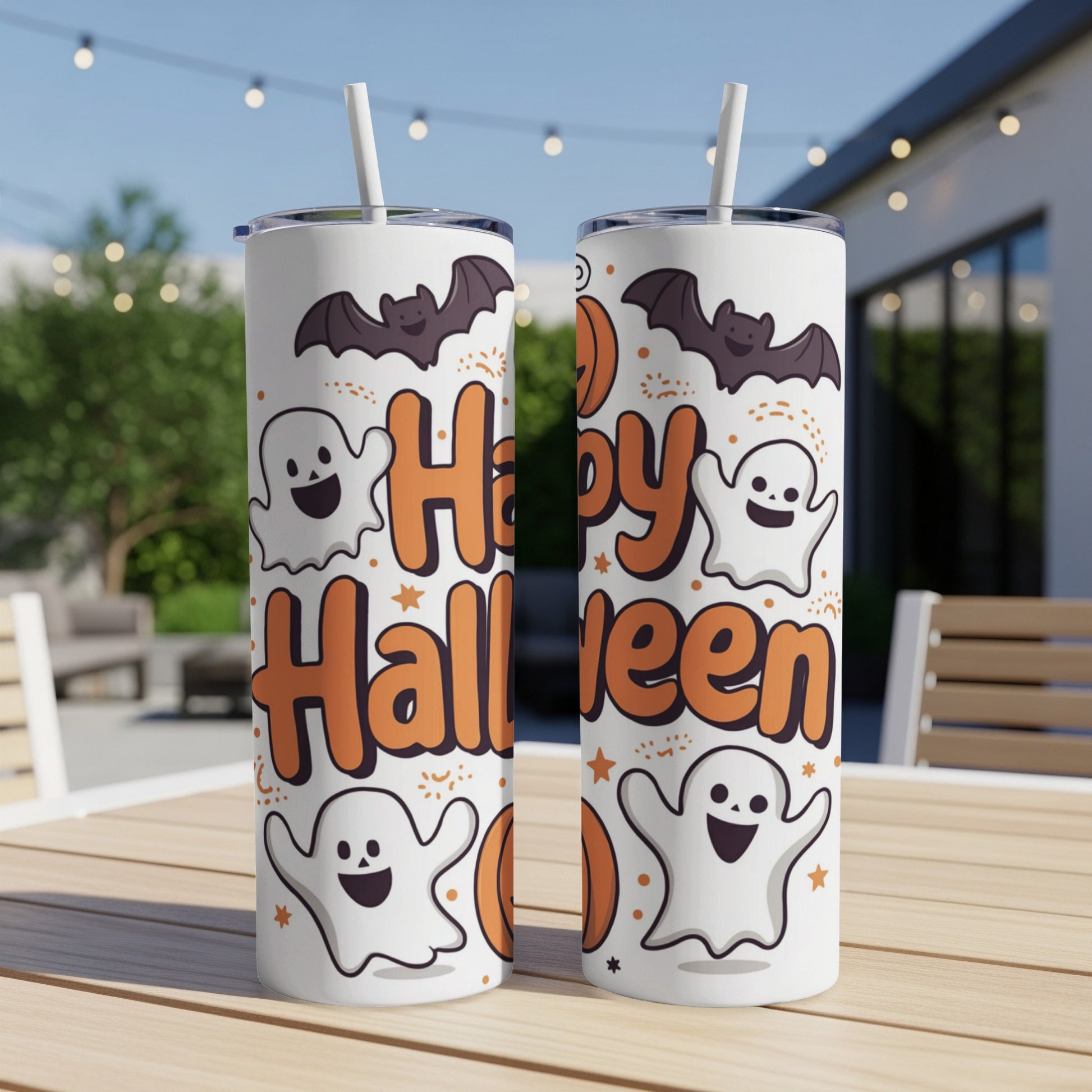 Two white tumblers with bats and ghosts celebrating Halloween, with orange text.