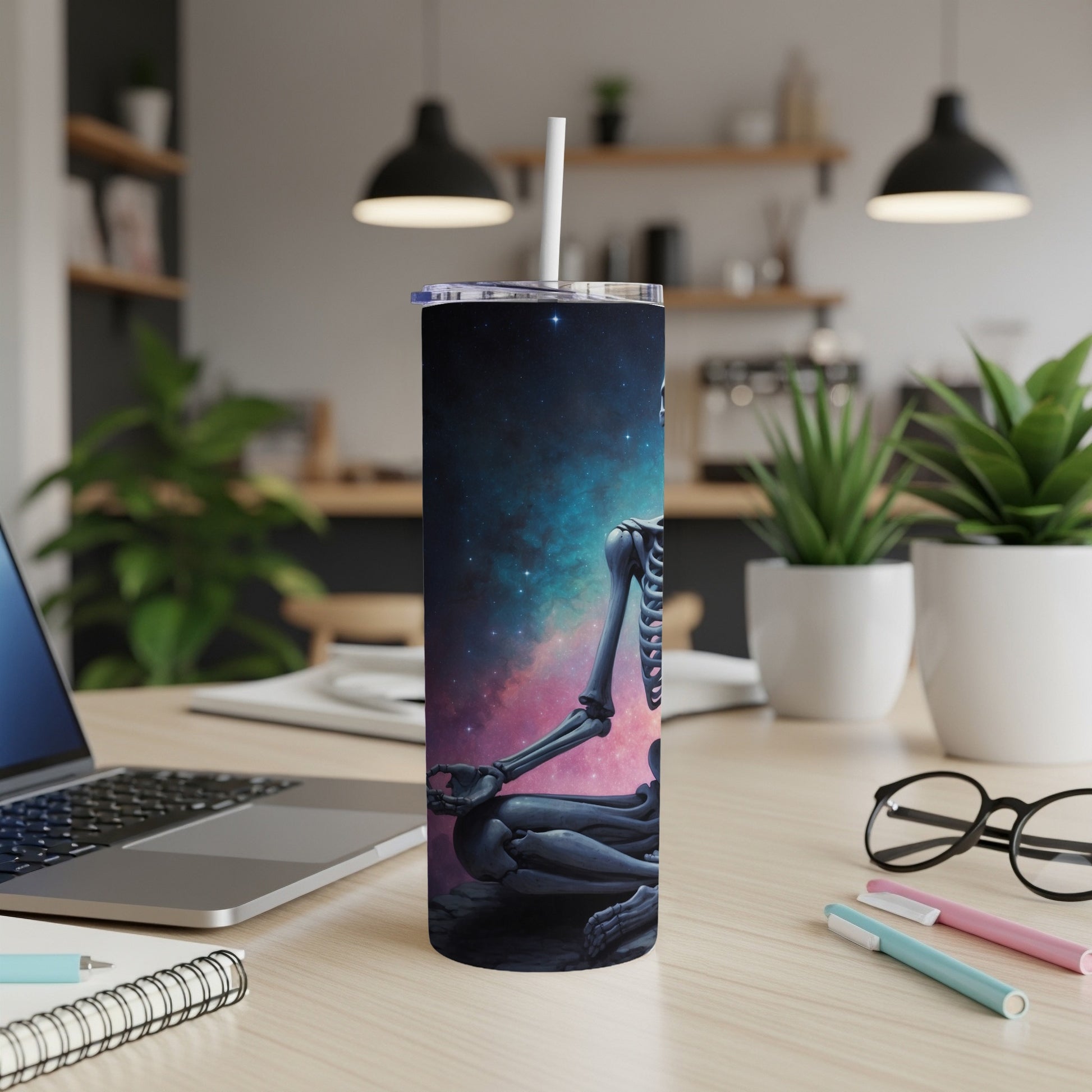Skeleton meditating in a cosmic background on a tumbler.