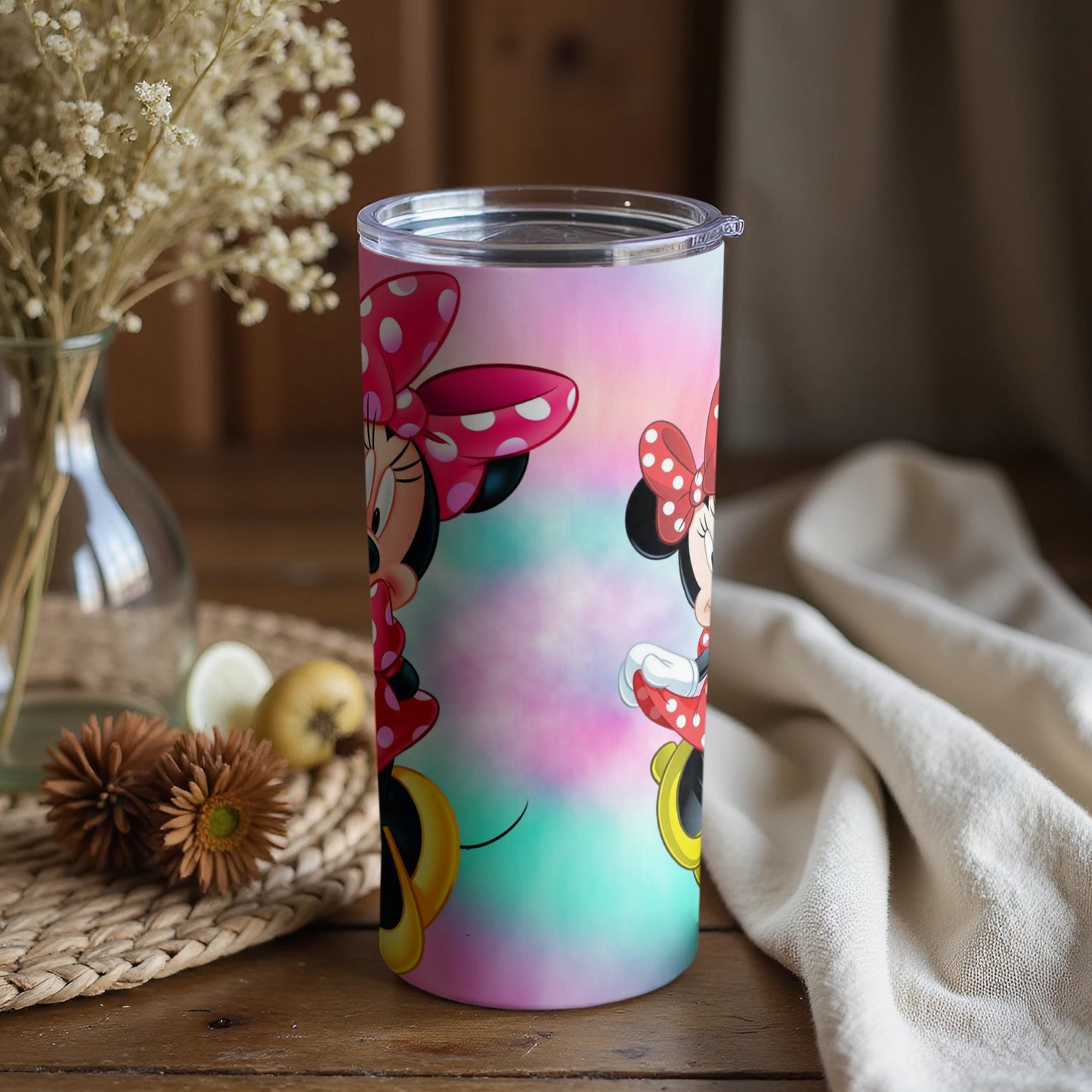 Colorful tumbler featuring a cartoon character design