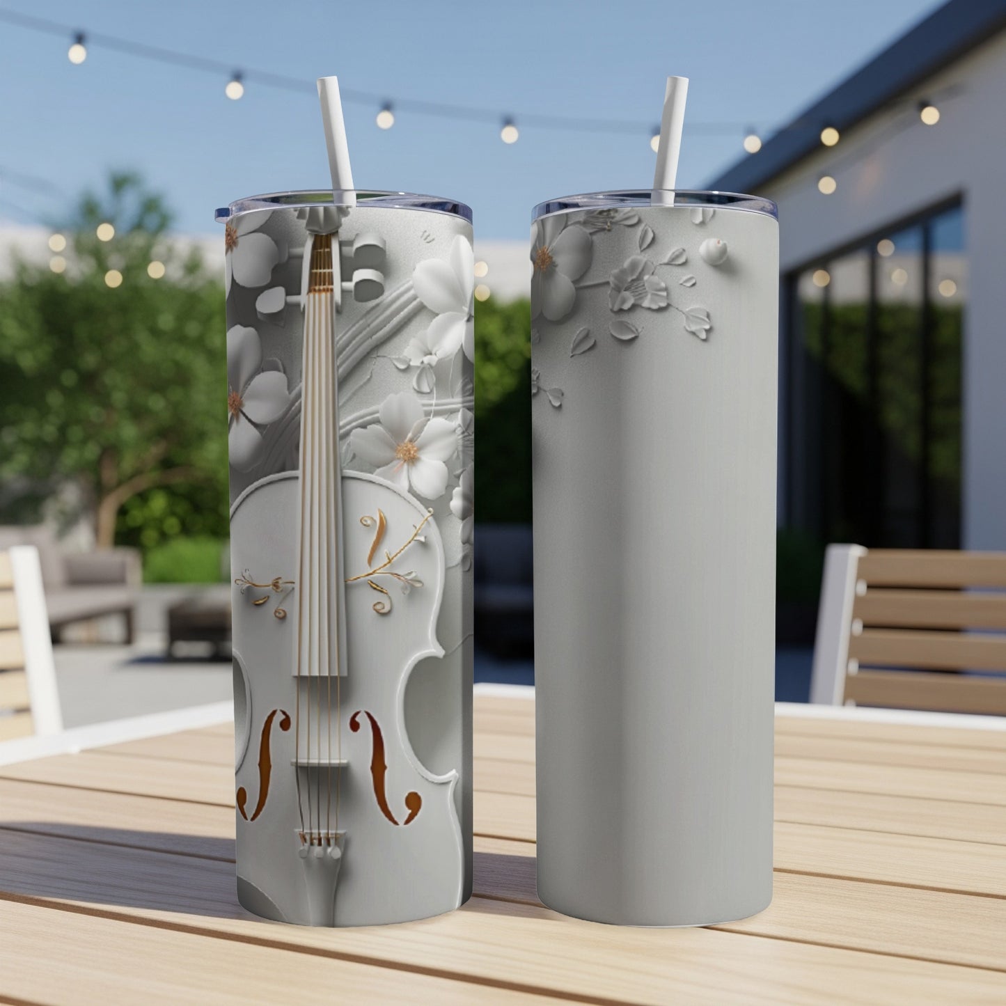 White violin and floral design on a white tumbler.