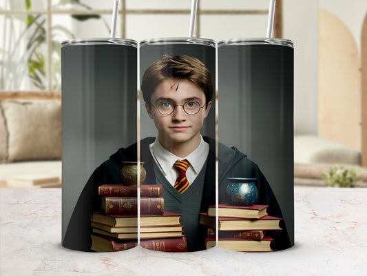Harry Potter tumbler with stacks of books and golden snitch.