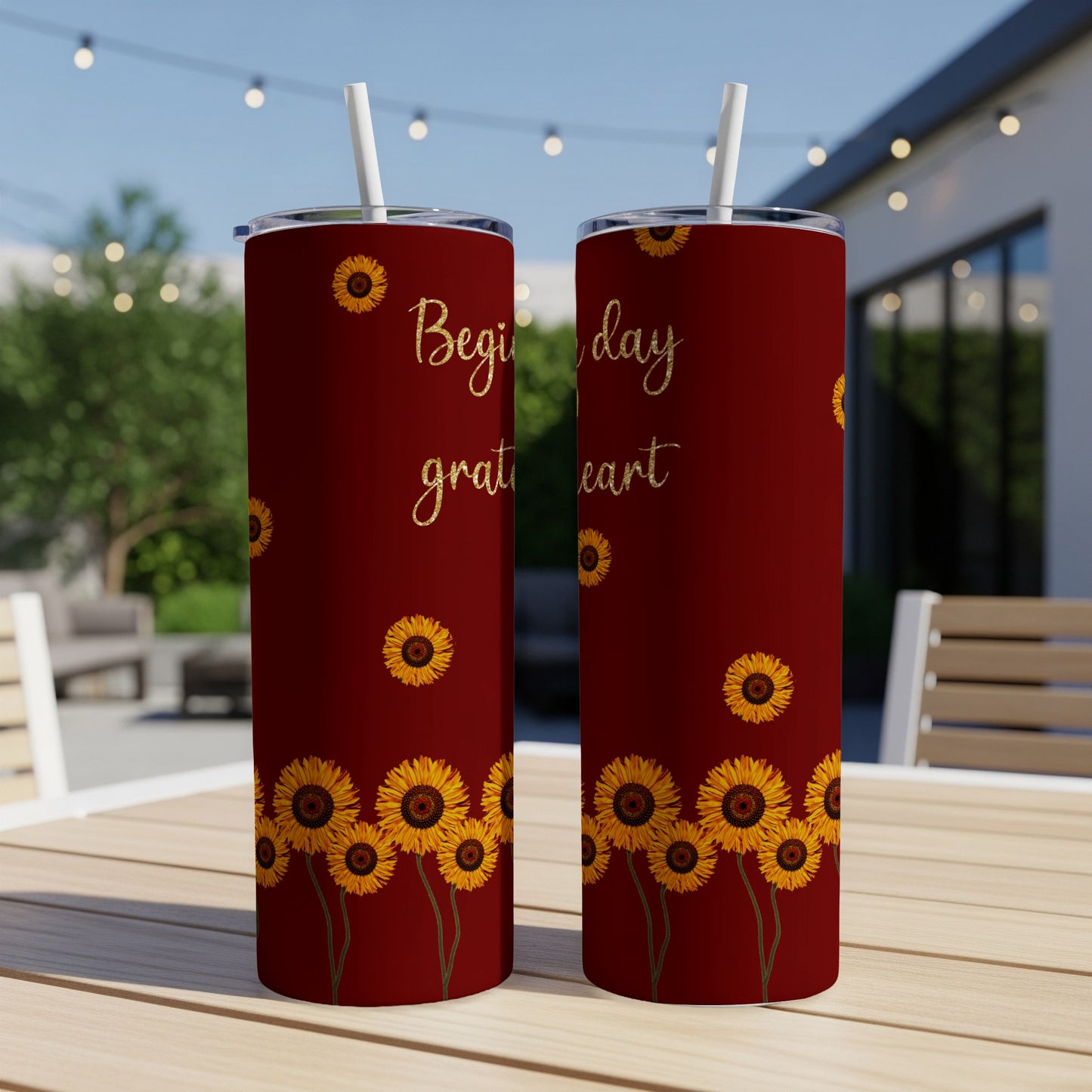 Burgundy tumbler with sunflowers and text "Begin day grateful heart."